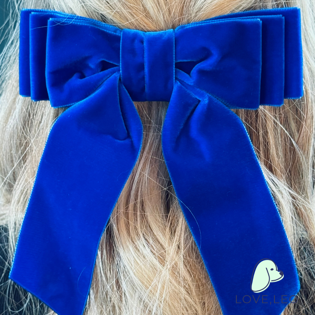 Luxe velvet hair bows are the perfect hair accessory for women and children. The Grace Bow is considered an oversized bow featuring beautiful long ribbon tails. Each bow is made with soft, luxurious velvet ribbon! Dimensions The Grace Bow measures approximately 6.75" wide and tails are approximated 8” long from top of bow to longest tip. This bow is secured on a 3" French barrette. * Luxe Velvet Ribbon * Oversized Hair Bow * French Barrette