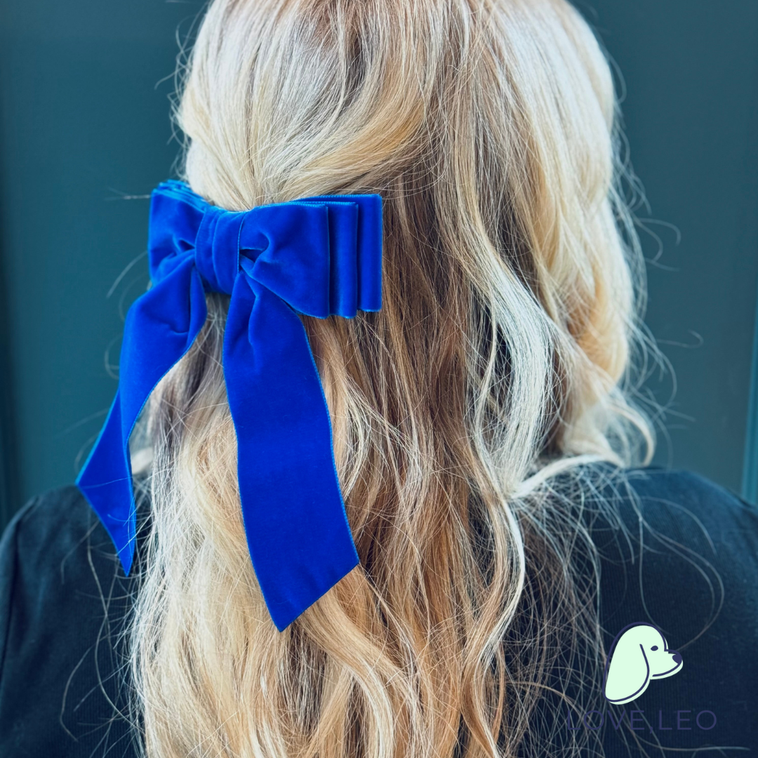 Luxe velvet hair bows are the perfect hair accessory for women and children. The Grace Bow is considered an oversized bow featuring beautiful long ribbon tails. Each bow is made with soft, luxurious velvet ribbon! Dimensions The Grace Bow measures approximately 6.75" wide and tails are approximated 8” long from top of bow to longest tip. This bow is secured on a 3" French barrette. * Luxe Velvet Ribbon * Oversized Hair Bow * French Barrette