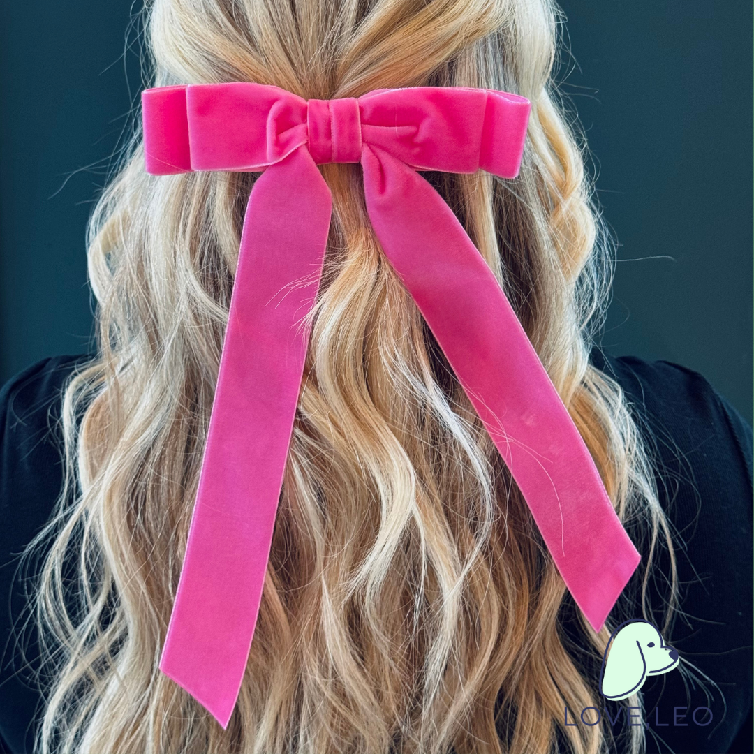 Luxe velvet hair bows are the perfect hair accessory for women and children. The Judy Long Bow is considered a "stacked" bow and features beautiful long ribbon tails. Each bow is made with soft, luxurious velvet ribbon! Dimensions The Judy Long Bow measures approximately 6.75" wide and tails are approximated 11" long from top of bow to longest tip. This bow is secured on a 3" French barrette. *Luxe Velvet Ribbon * “Stacked” Bow * French Barrette