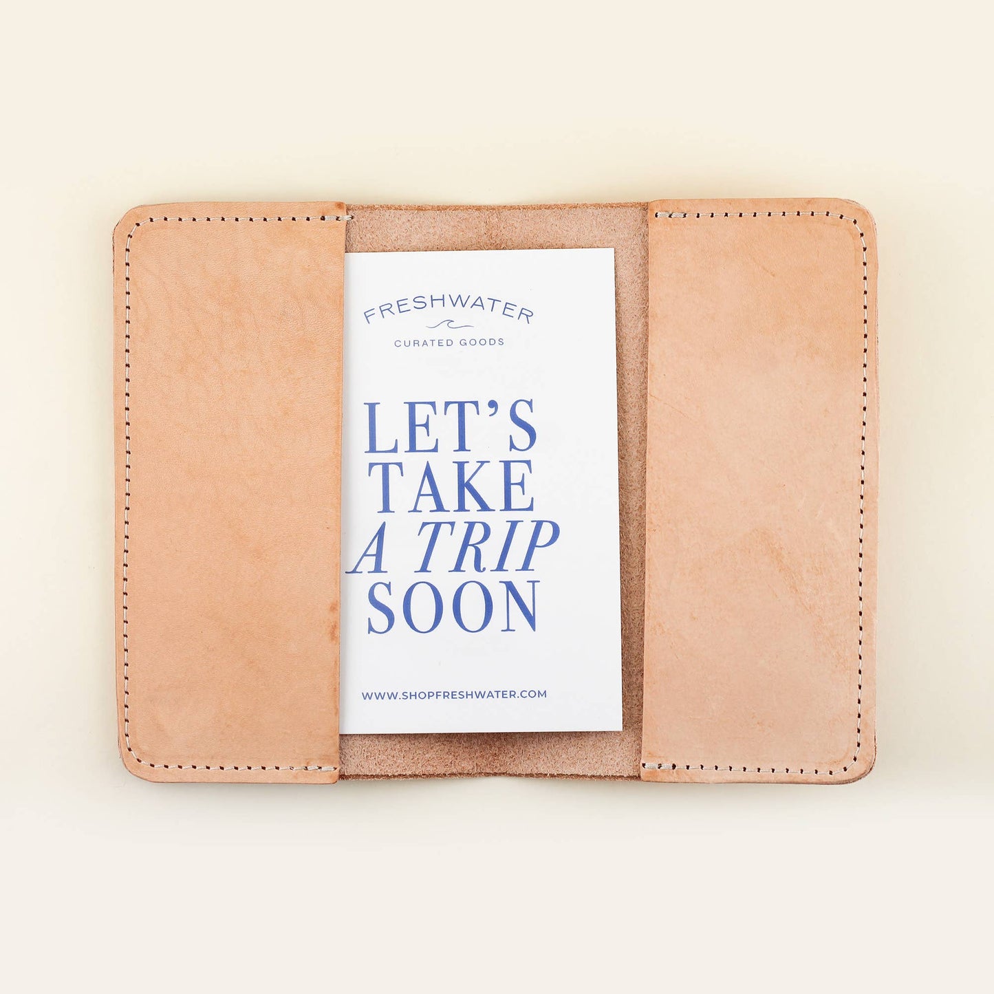 Where ever you may go, take our handcrafted All You Need Passport Cover along for the journey. DETAILS: Individual Size: 6" L x 4" H Made of Top-Grain Leather with a Suede Strap Interior includes two pockets Comes packaged in a beautifully branded Freshwater box CARE INSTRUCTIONS: Wipe with a soft, dry cloth