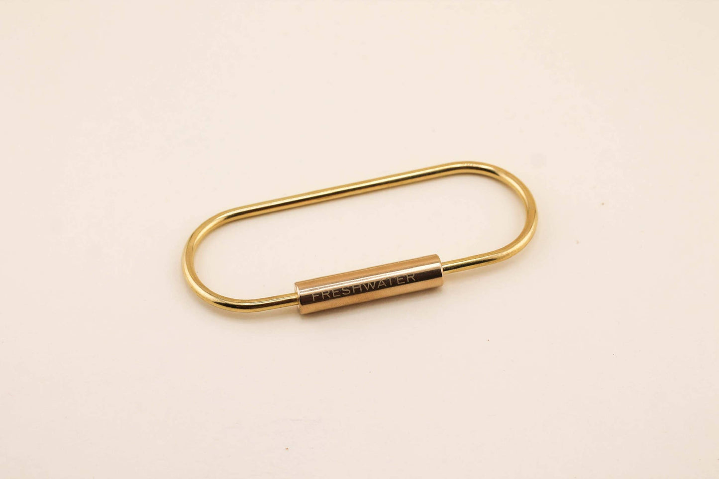 Hold onto your keys with ease with our Brass Oval Key Ring. This solid brass key ring is the perfect add-on to our handcrafted keychains and features a screw lock to keep all of your keys secured.