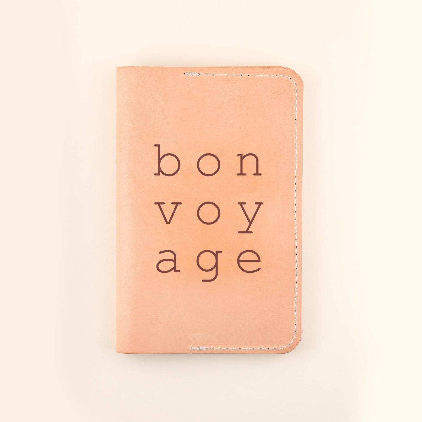 Where ever you may go, take our handcrafted Bon Voyage Passport Cover along for the journey. DETAILS: Individual Size: 6" L x 4" H Made of Top-Grain Leather with a Suede Strap Interior includes two pockets Comes packaged in a beautifully branded Freshwater box CARE INSTRUCTIONS: Wipe with a soft, dry cloth
