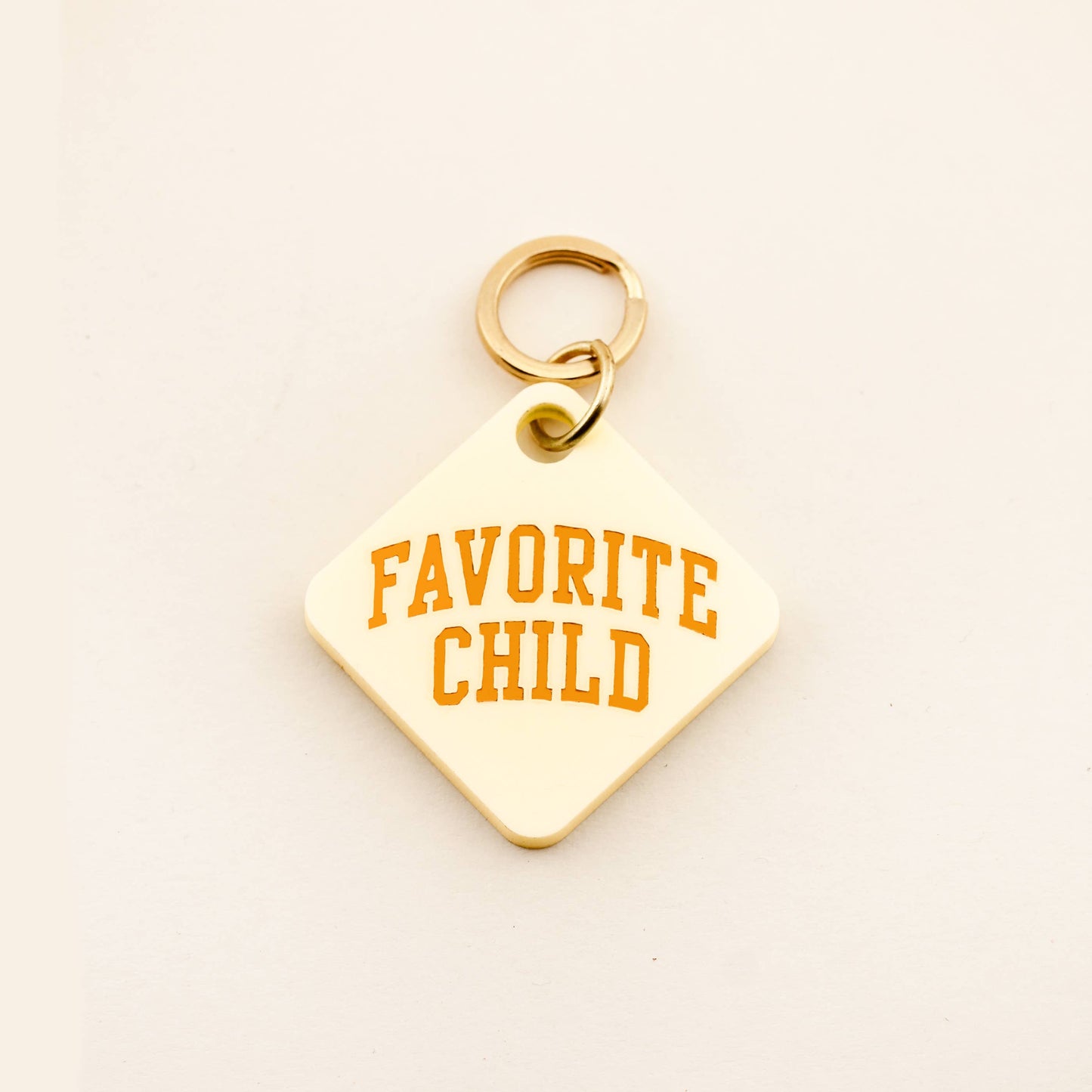 Let everyone know that your dog is your fur-baby with our Favorite Child Pet Tag. This handcrafted dog tag is a fun way for you to show off your pet's personality. DETAILS: Pet tags are sold individually Size: 1.18" Diameter Made of high-quality acrylic with color-fill Handcrafted in Augusta, Georgia