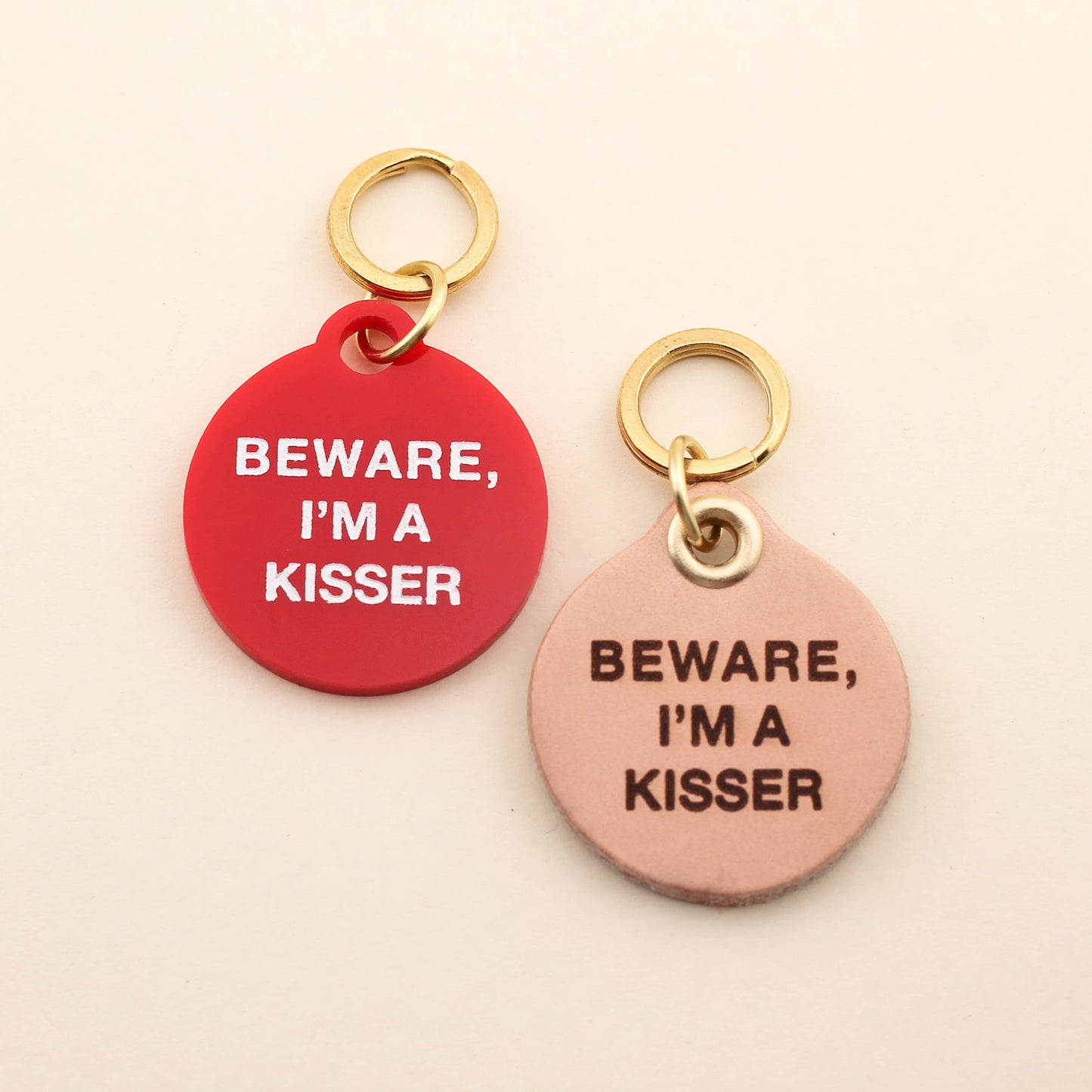 Designed for pets that love to give out kisses! Our Beware, I'm A Kisser Pet Tag comes in our high-quality Red Acrylic! Pet tags are sold individually Size: 1.25" L by 1.4" H Made of high-quality acrylic with color-fill Handcrafted in Augusta, Georgia